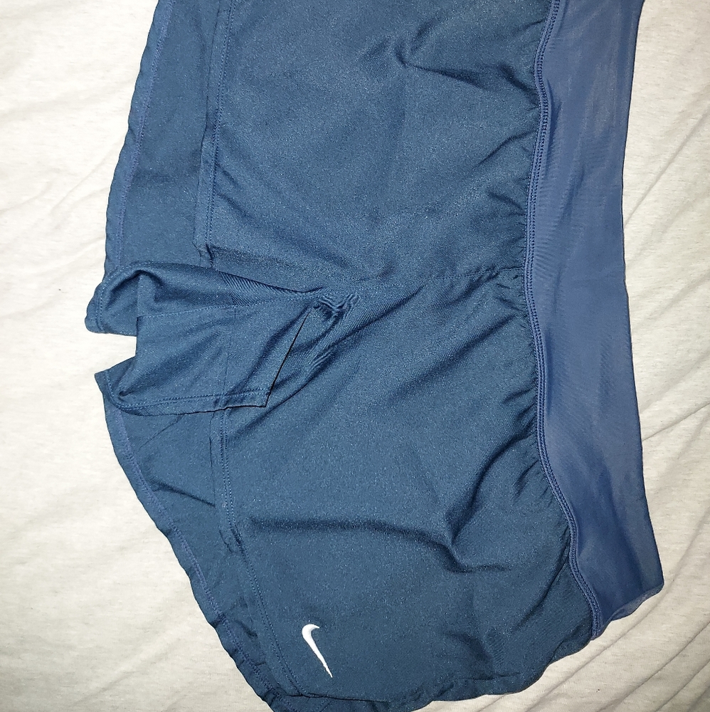 Never blue Nike running shorts